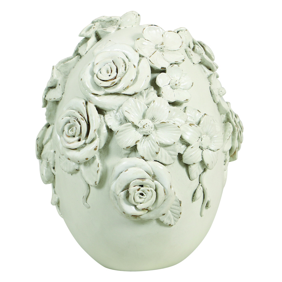 Statue œuf blanc motif floral