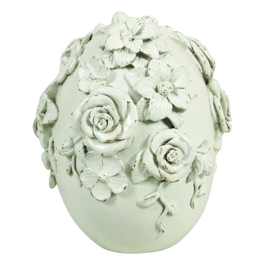 Statue œuf blanc motif floral